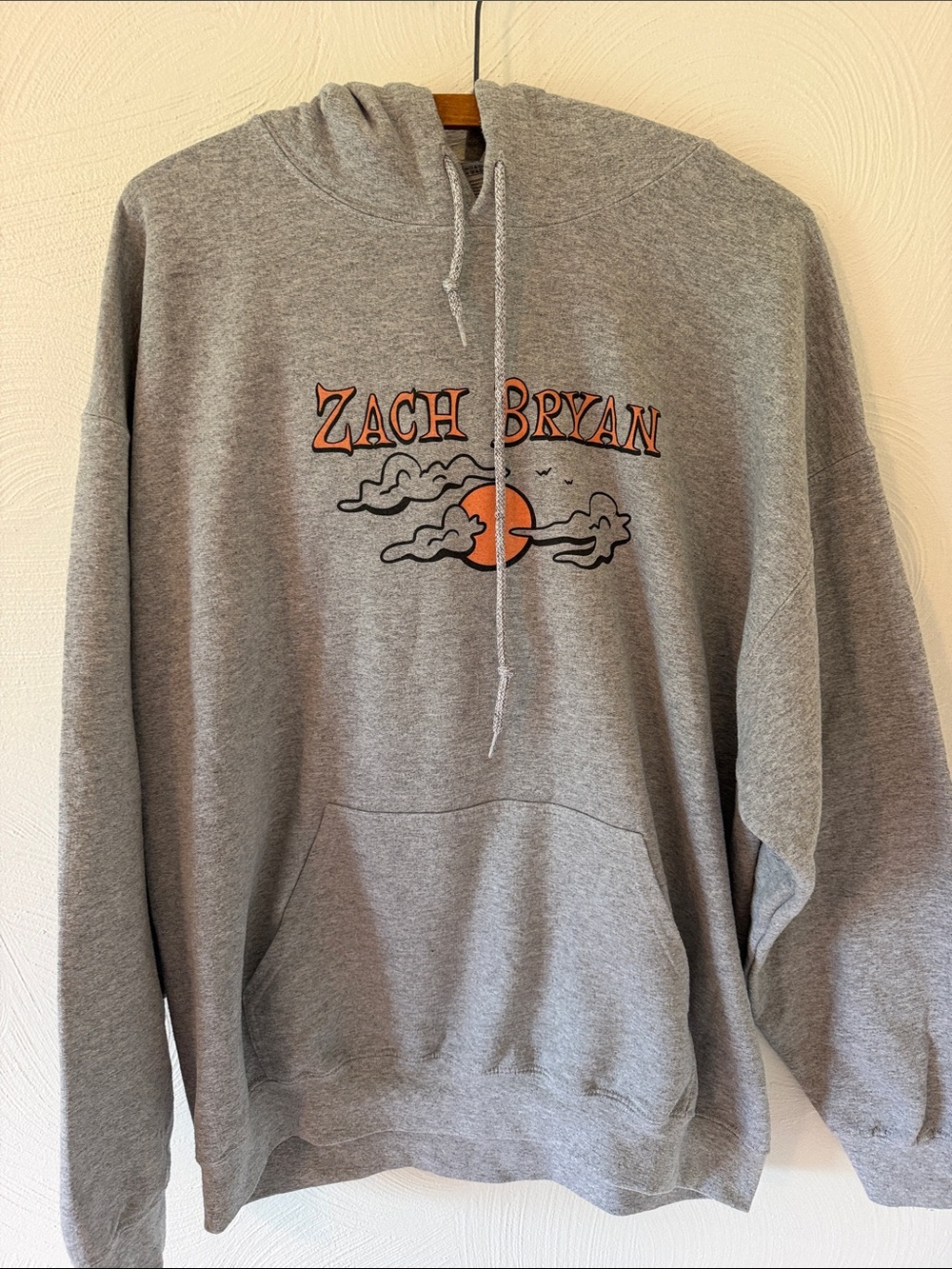 Gildan Gray Hoodie with Orange Zach Bryan Graphic. Size Large.